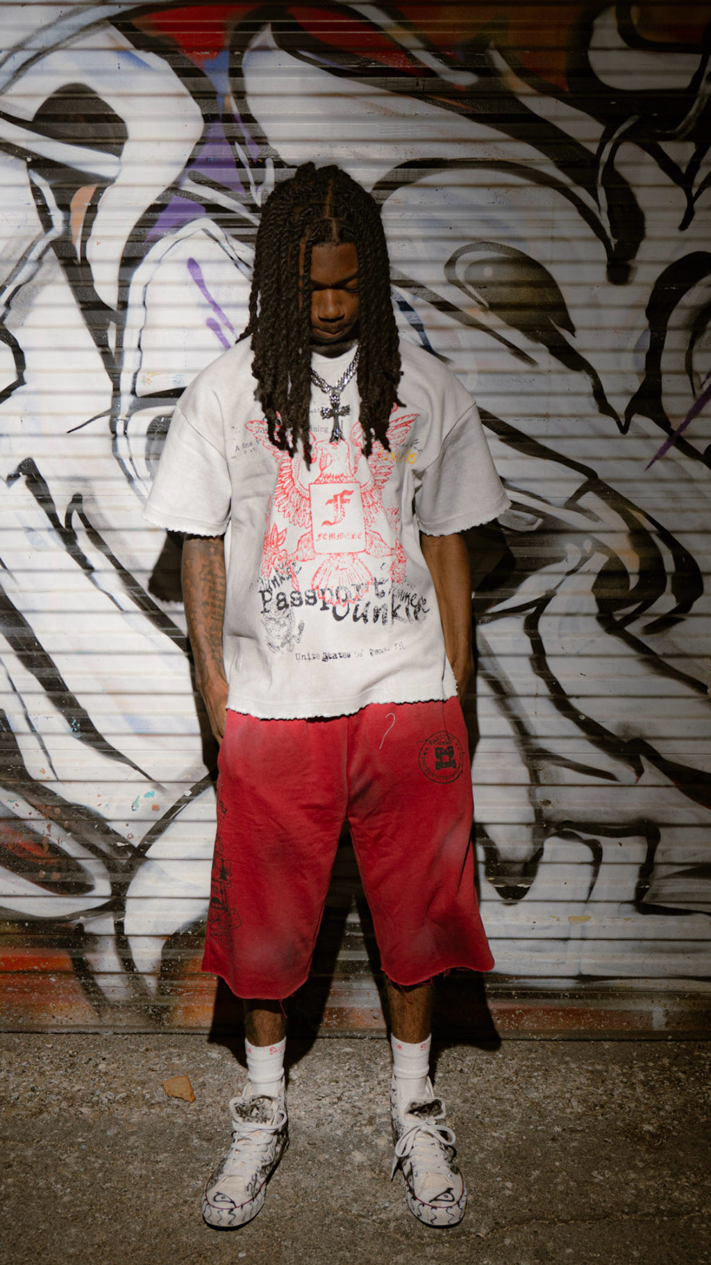 “Passport Junkie”  red shorts