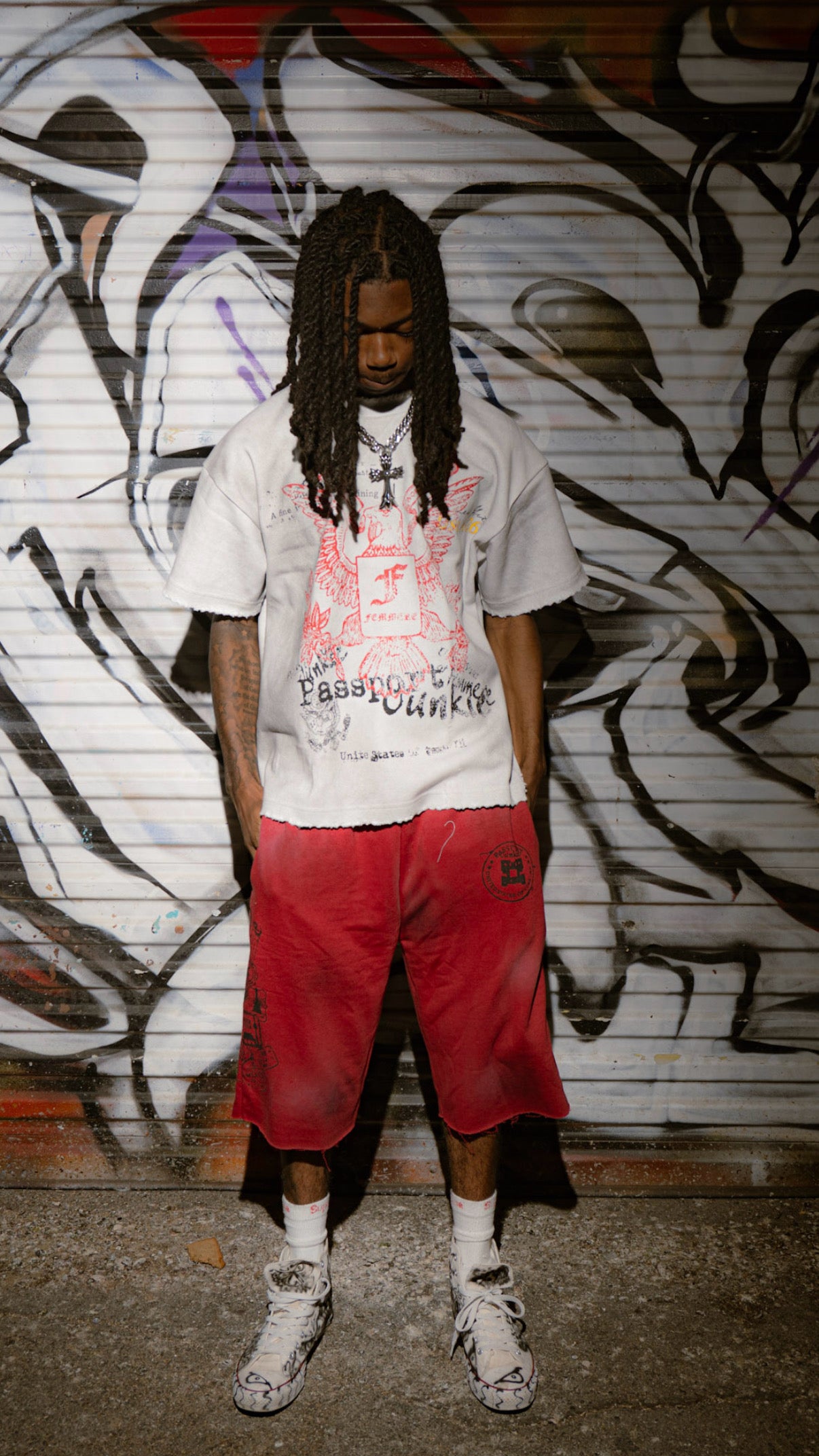 “Passport Junkie”  red shorts