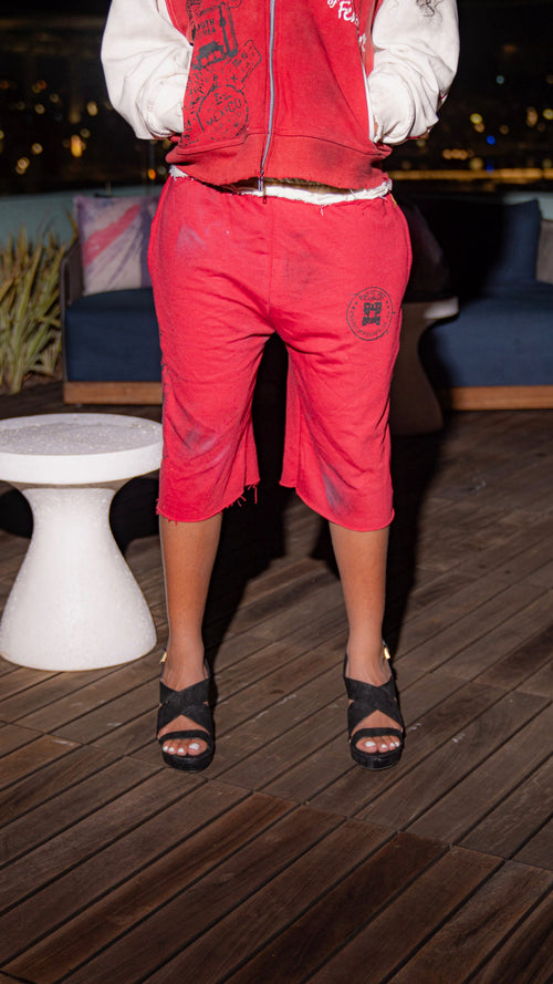 “Passport Junkie”  red shorts
