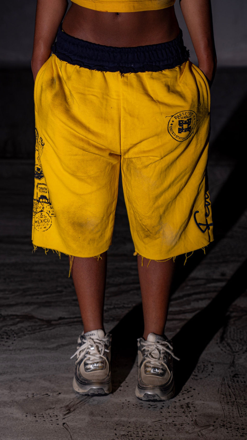 “Passport Junkie”  yellow shorts